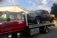 Wrecker_Hauling_Truck_That-_Had_Caught_on_Fire_in_Cookeville